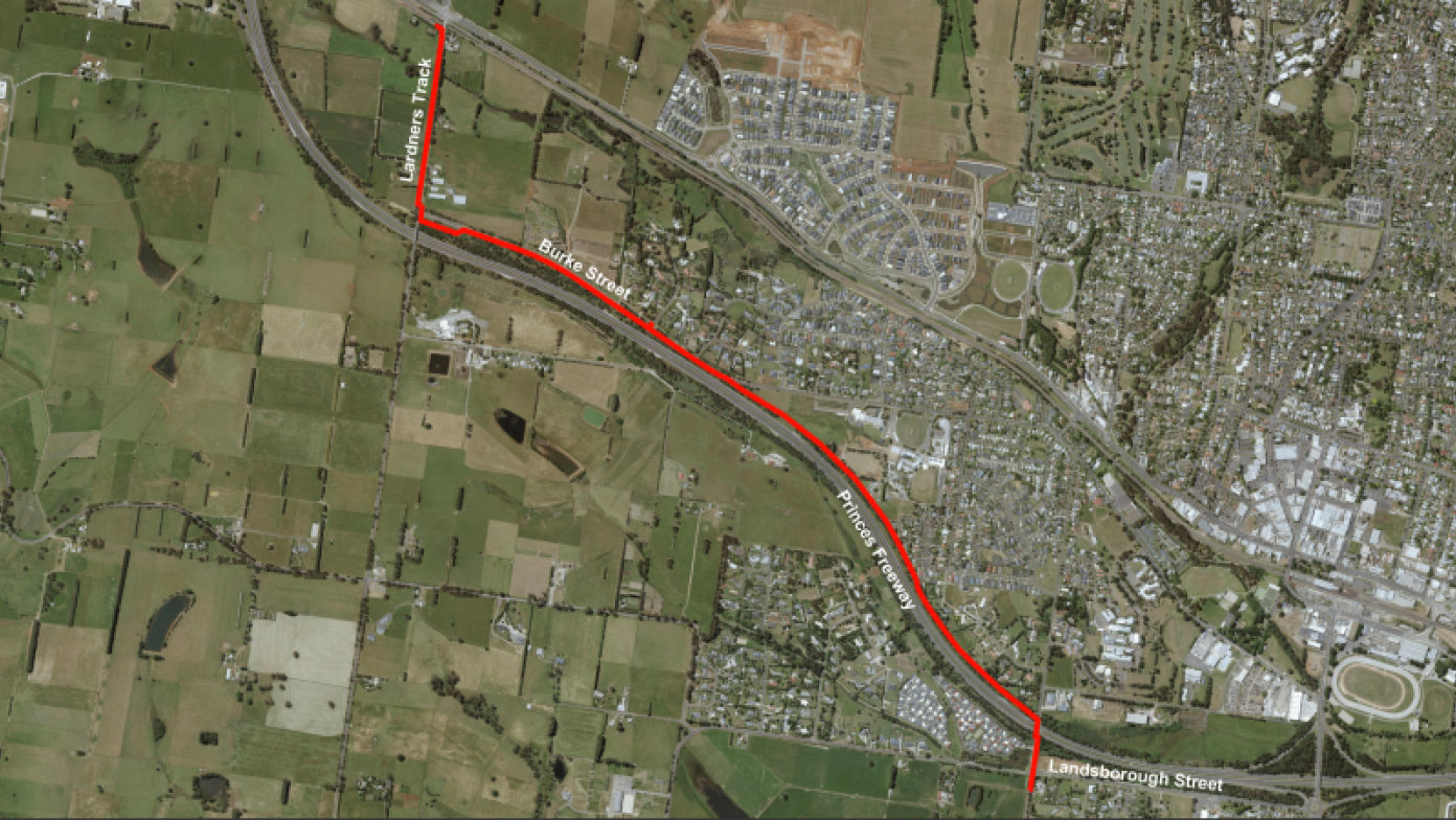 Aerial image with pipeline marked in red.