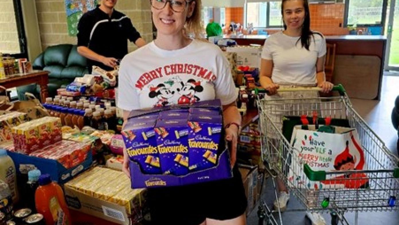 Social club members packing food hampers