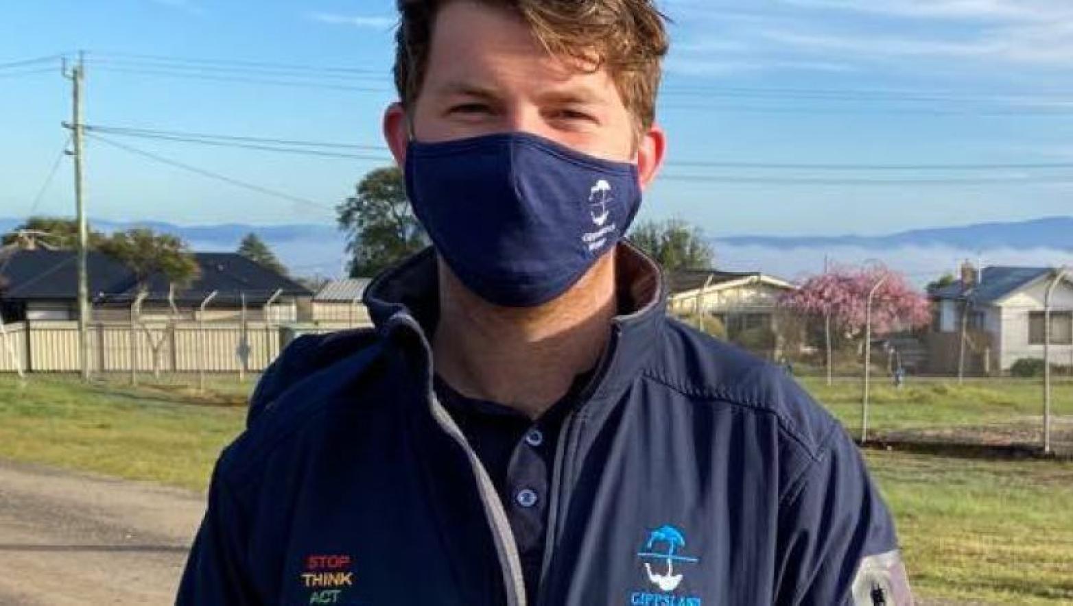 Man in Gippsland Water uniform wearing facemask. 