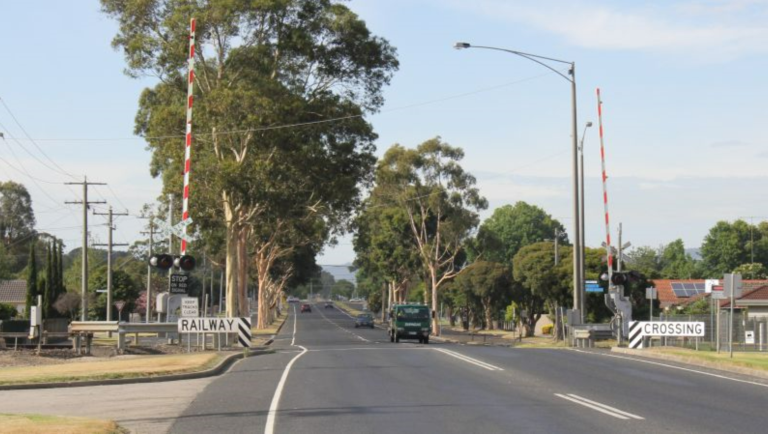 Road with level crossing.